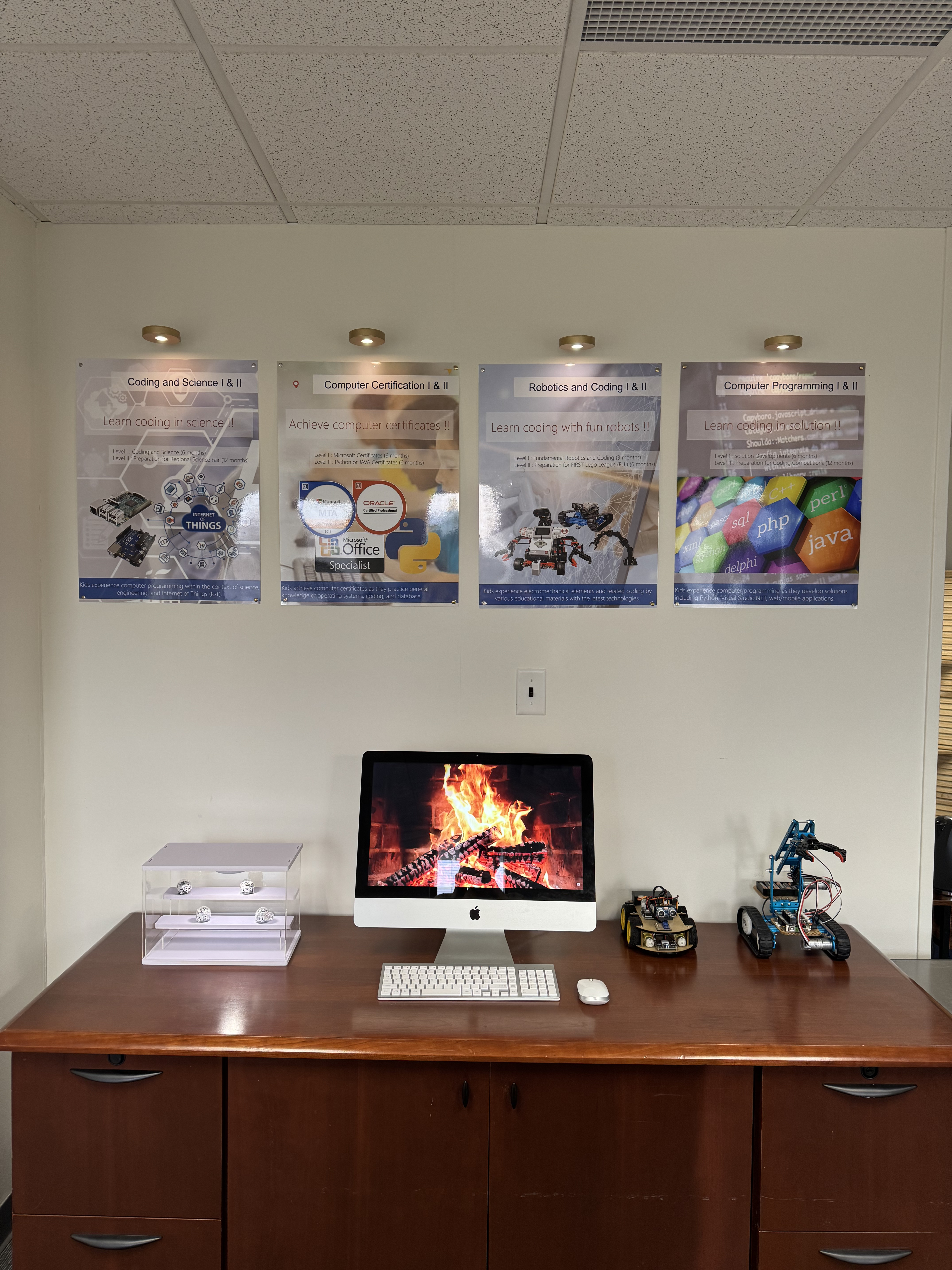 Conference cabinet with posters, iMac and robotics kits